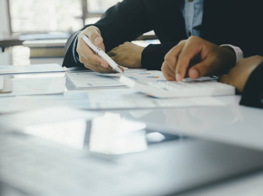 LLC formation documents and pen on a desk for bookkeeping for small business owners in Texas